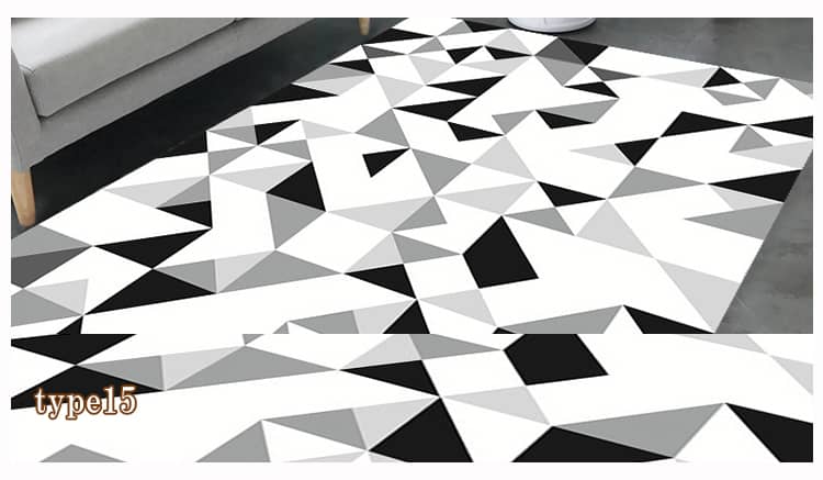 大胆な幾何学的な図案のパターンを描いたカーペット